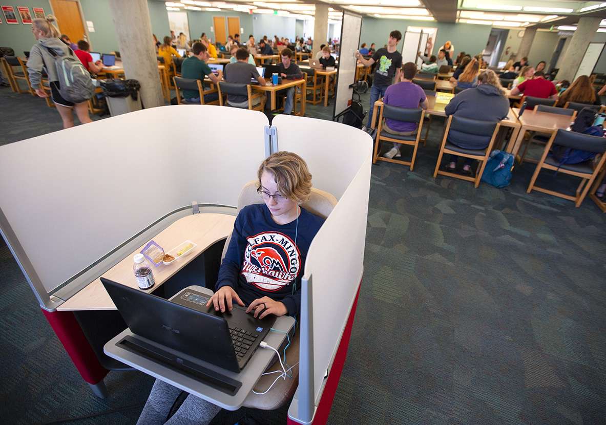 Student using Brody chair on third floor